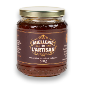 Pot de miel de l'Artisan infusé à la vanille de Madagascar.
